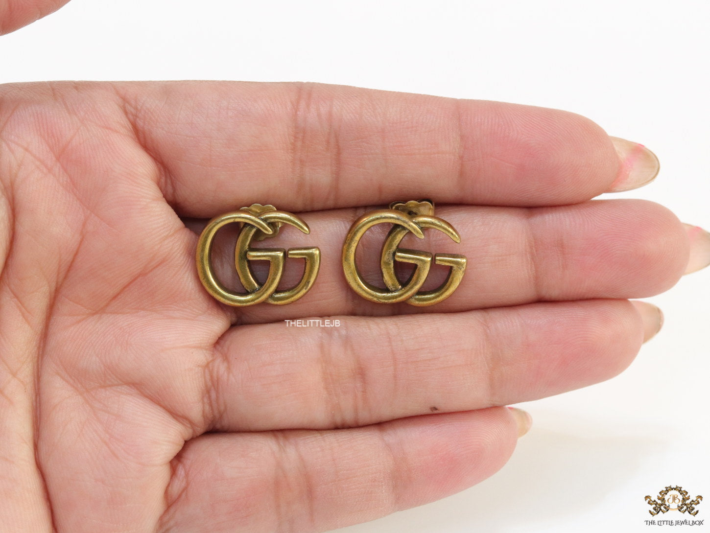 Gold plated twin G alphabet stud earrings