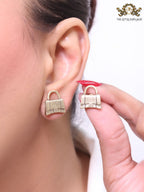 Alphabet B bag studs in platinum finish