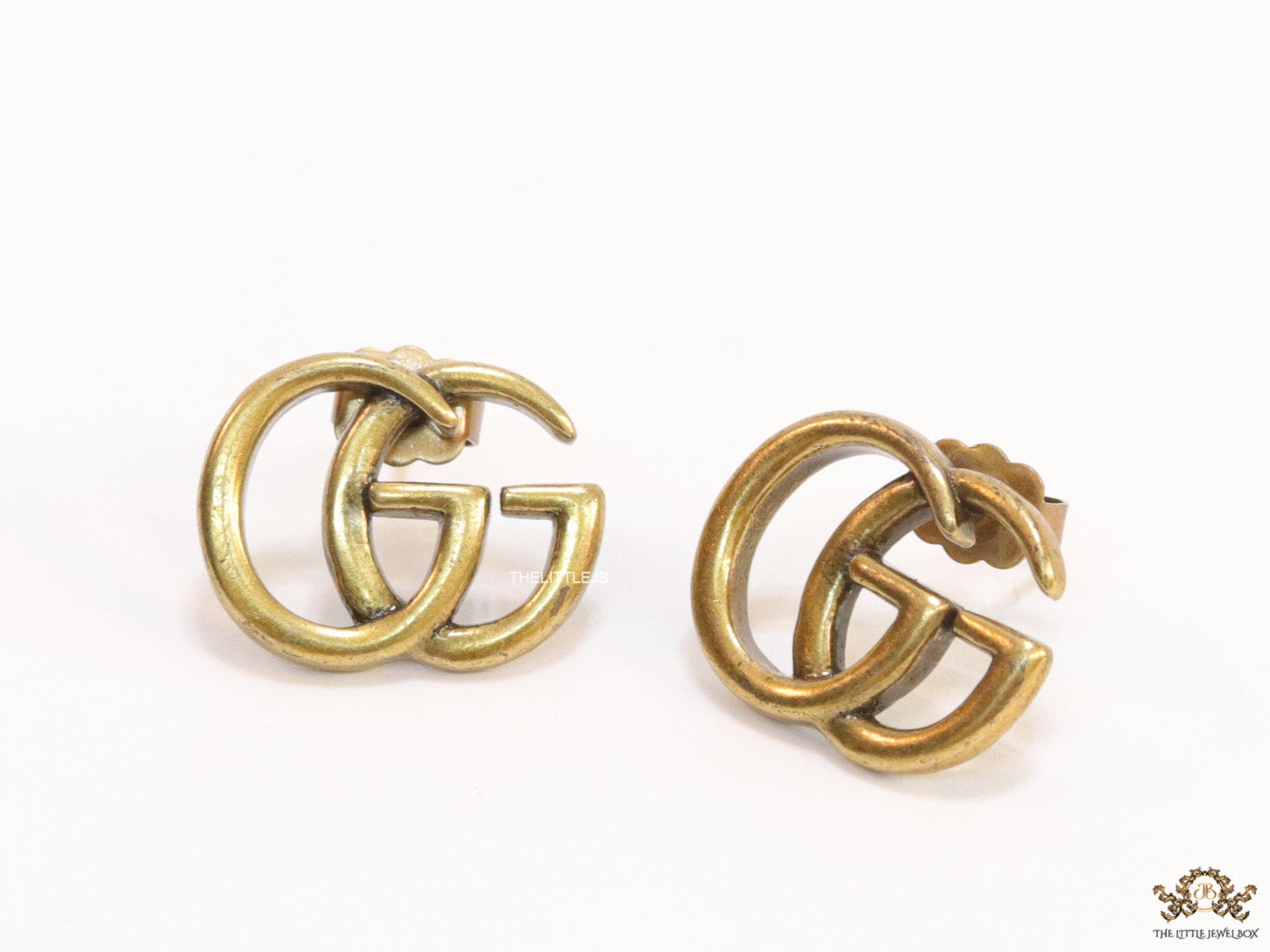 Gold plated twin G alphabet stud earrings