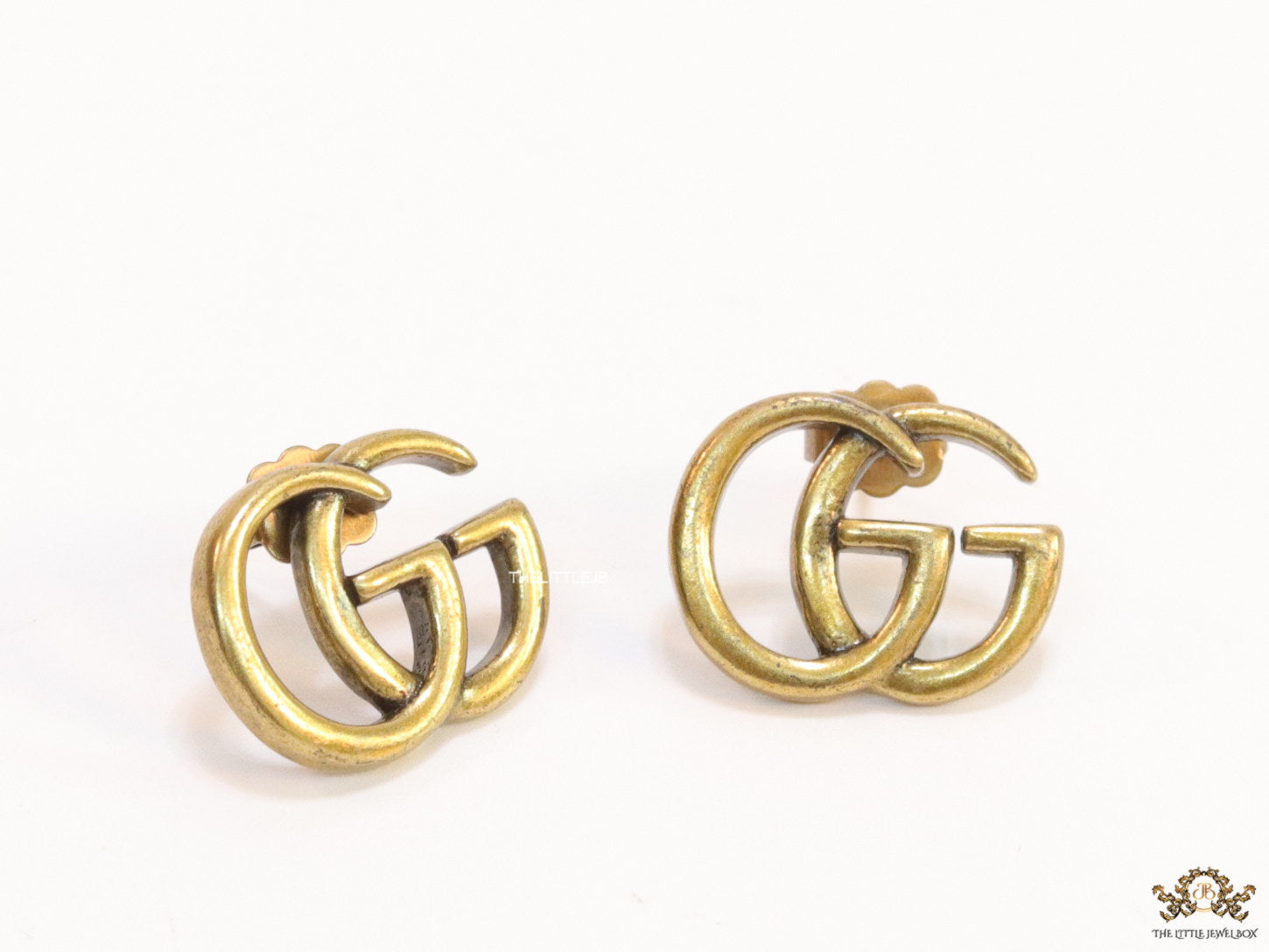 Gold plated twin G alphabet stud earrings