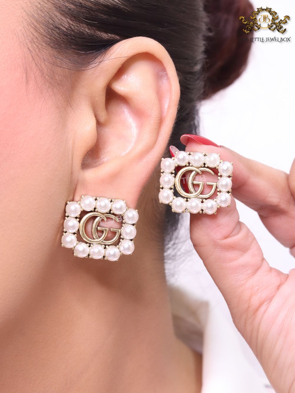 Double G rustic pearl studs