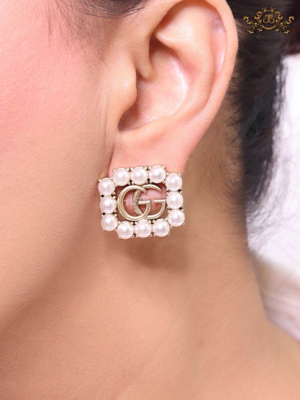 Double G rustic pearl studs