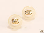 White acrylic studs with pearl and twin C motif