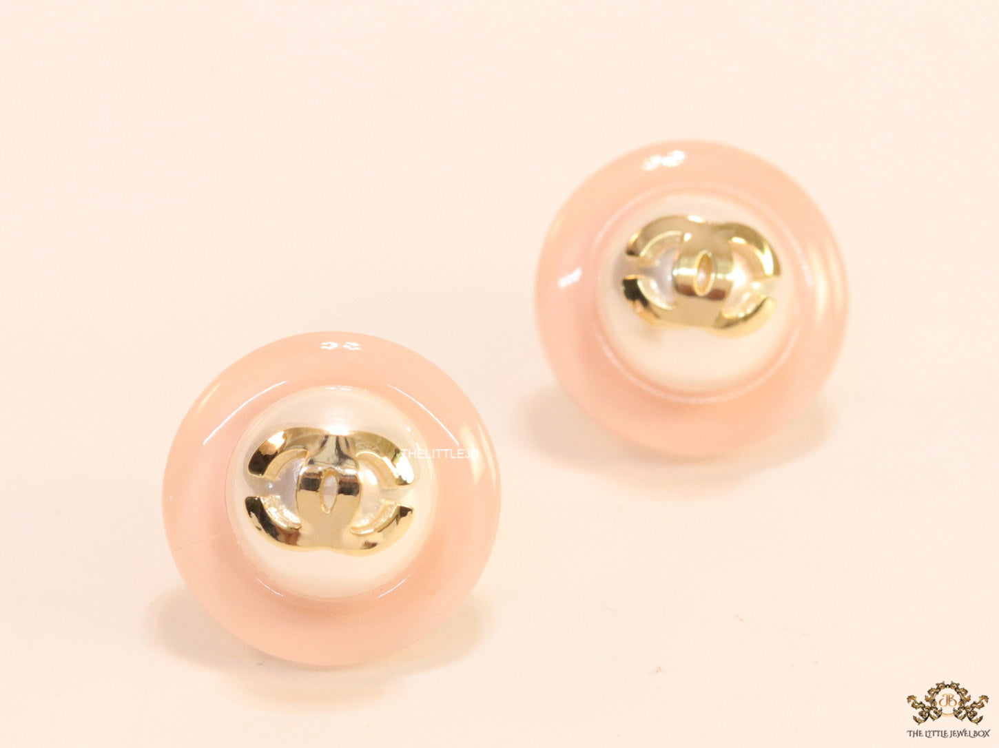 Pink acrylic studs with pearl and twin C motif