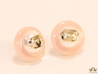Pink acrylic studs with pearl and twin C motif