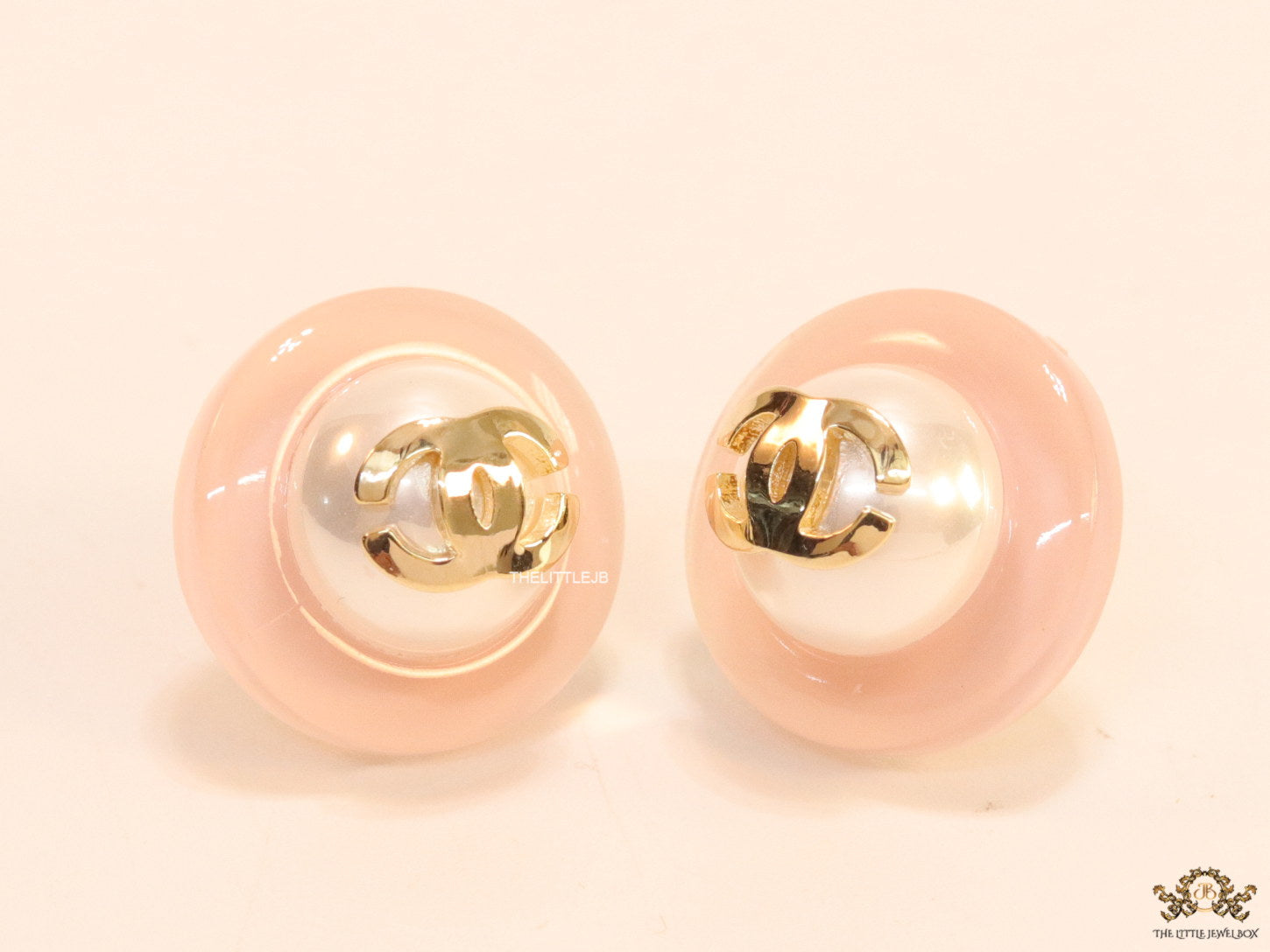 Pink acrylic studs with pearl and twin C motif