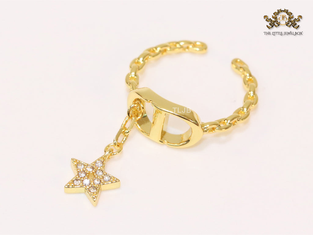 Open V with star charm ring