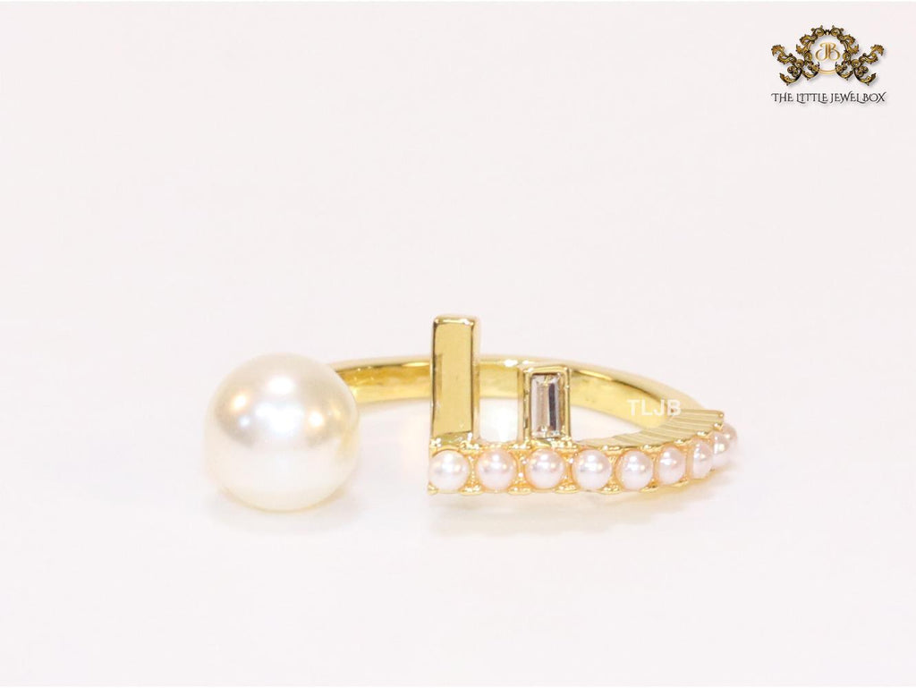 Pearl and alphabet F open ring
