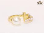 Pearl and alphabet F open ring