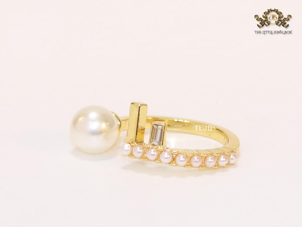 Pearl and alphabet F open ring