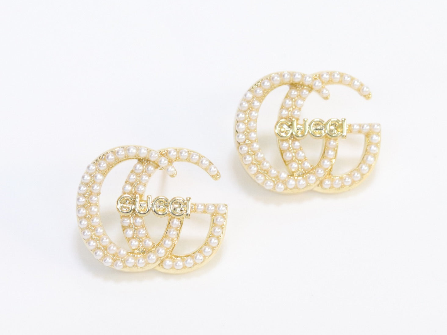 Double G pearl earrings in gold finish