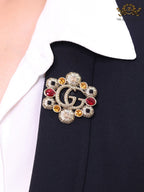 Double G embossed rustic brooch with multi coloured stones