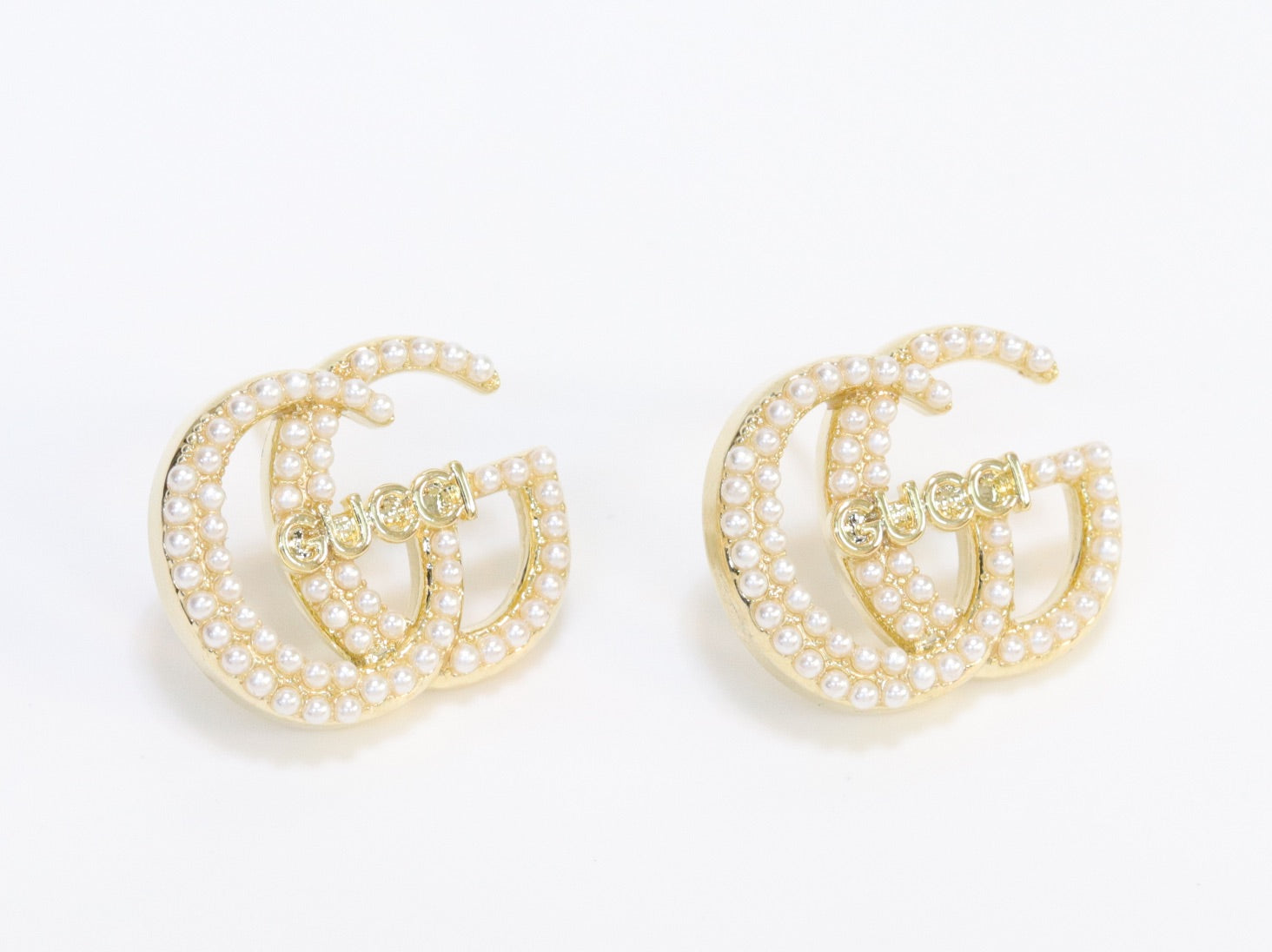 Double G pearl earrings in gold finish