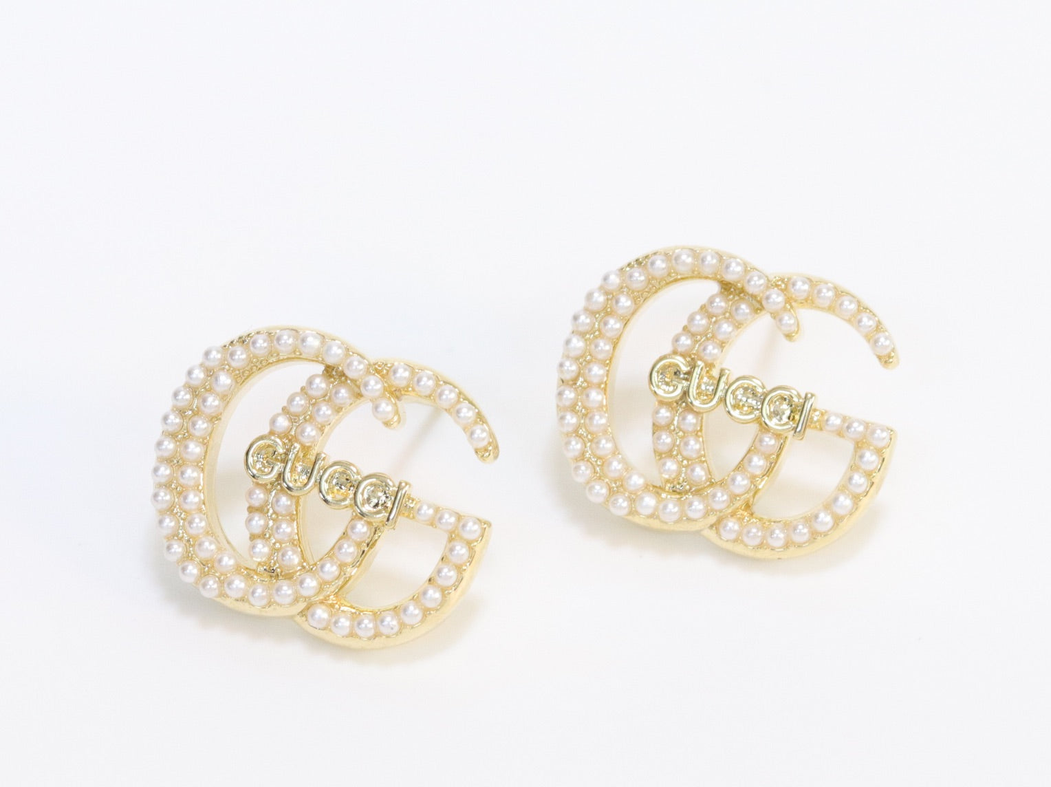 Double G pearl earrings in gold finish