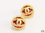 Twin C motif matt gold plated round studs on red base