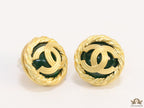 Twin C motif matt gold plated round studs on deep green base