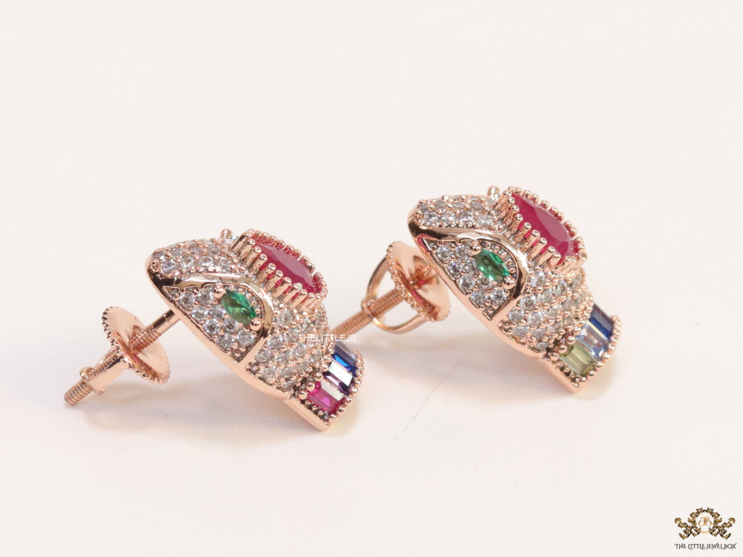 Rose gold plated serpentine head stud earrings with multi color cz