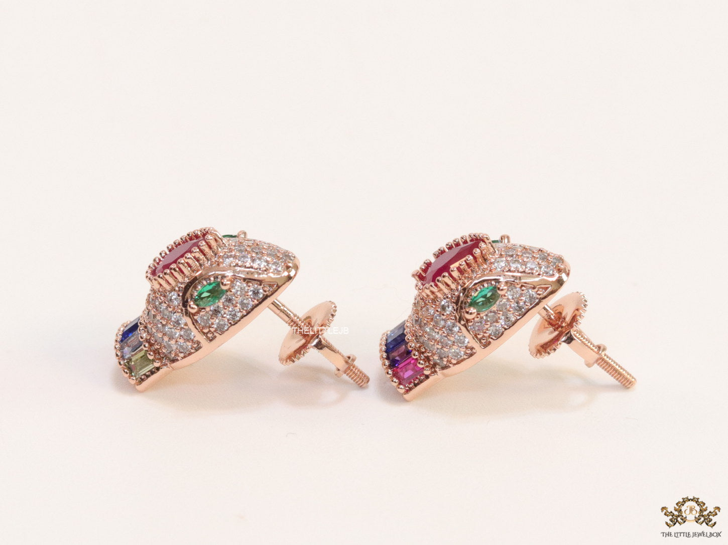 Rose gold plated serpentine head stud earrings with multi color cz