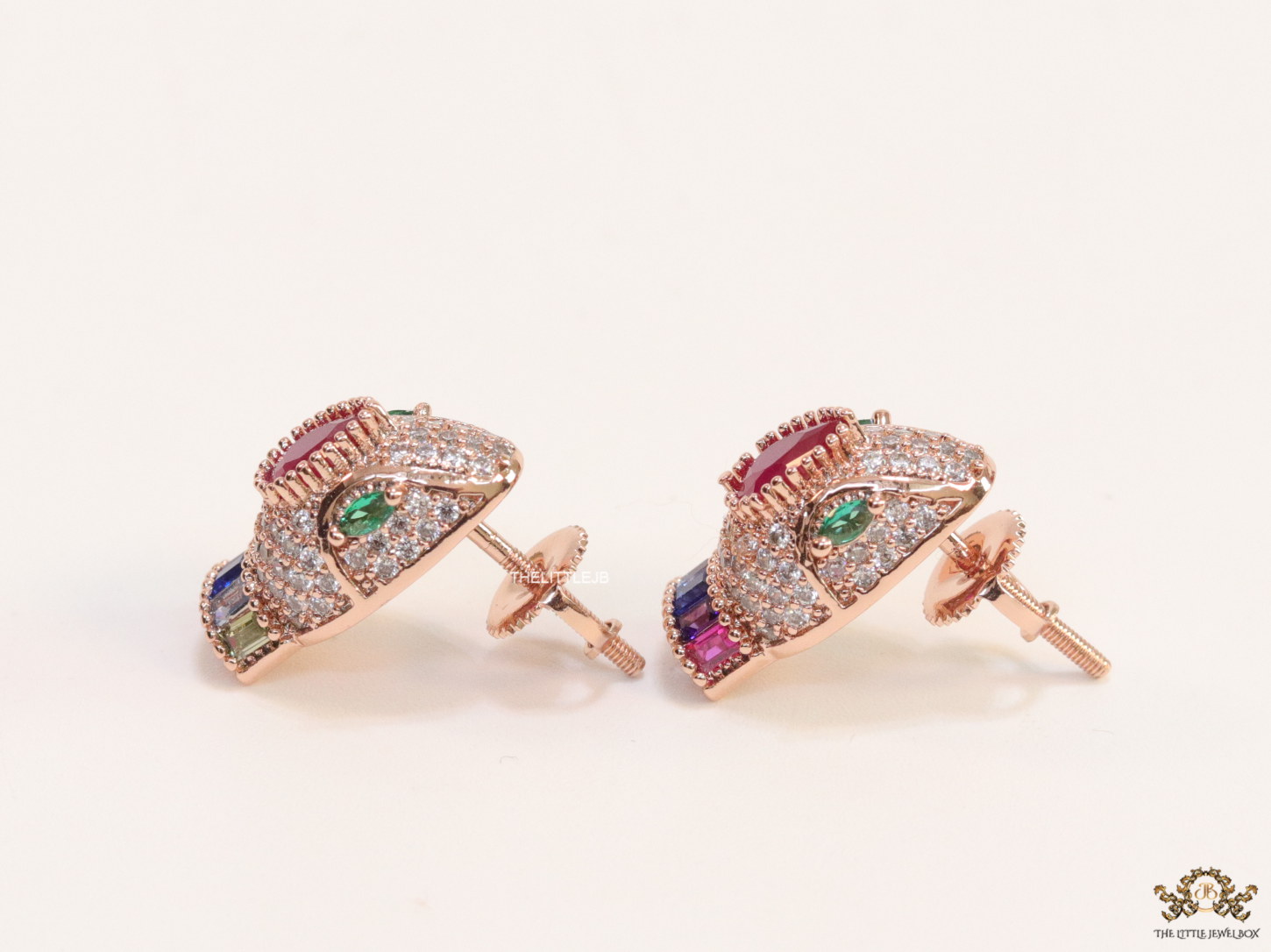 Rose gold plated snake head stud earrings with multi color cz