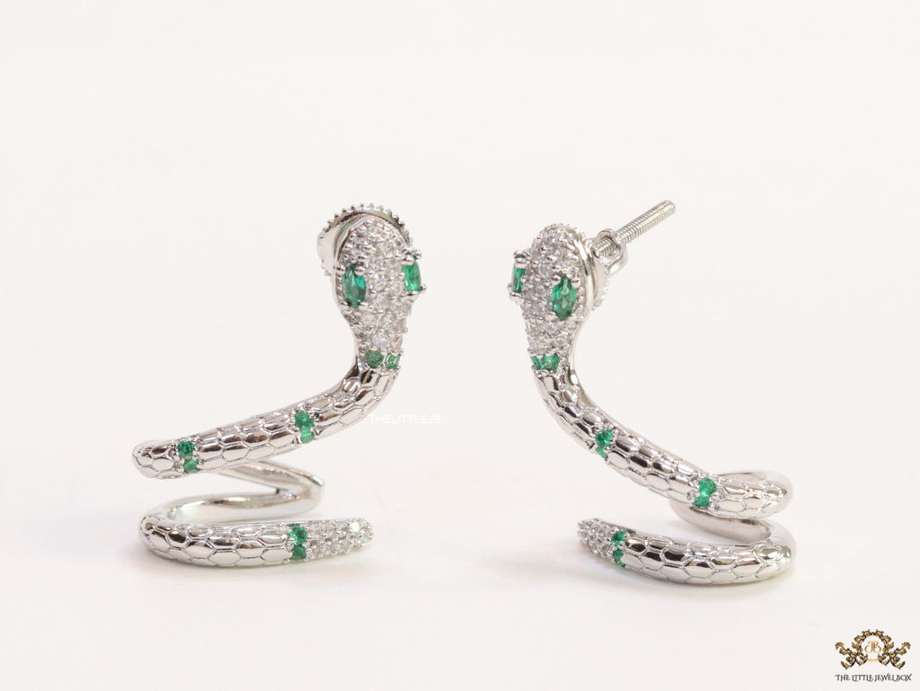 Platinum plated ear cuff pattern serpentine earrings with green cz