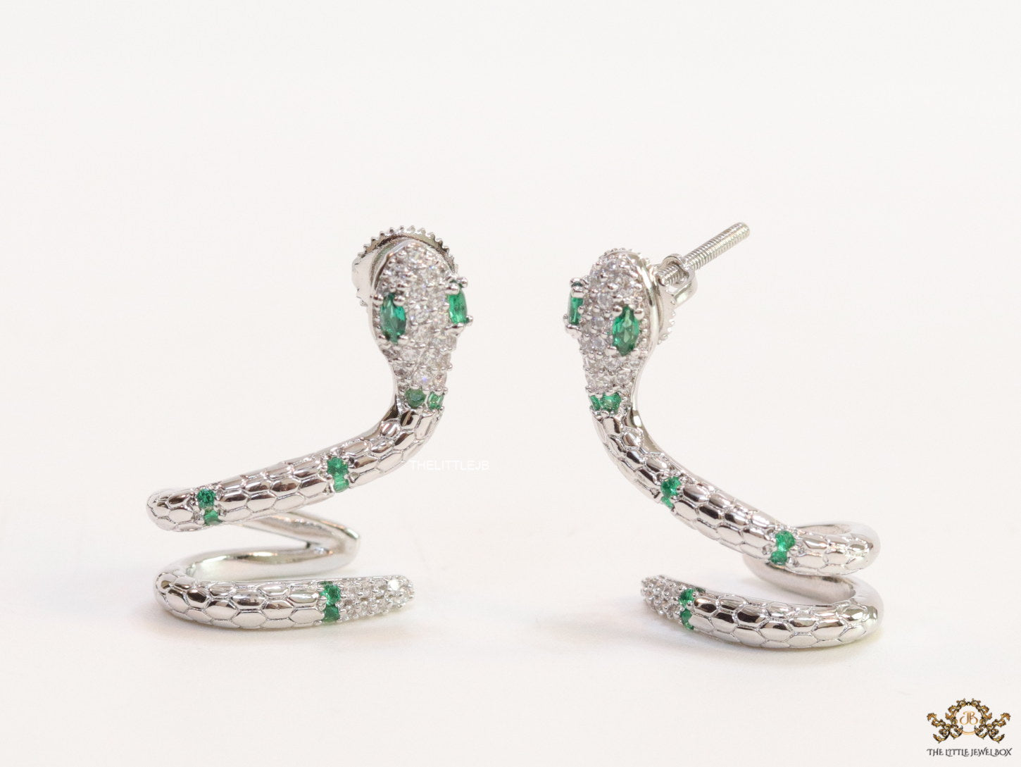 Platinum plated ear cuff pattern serpentine earrings with green cz