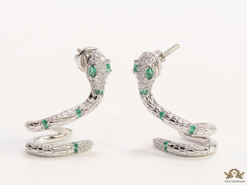 Platinum plated ear cuff pattern serpentine earrings with green cz