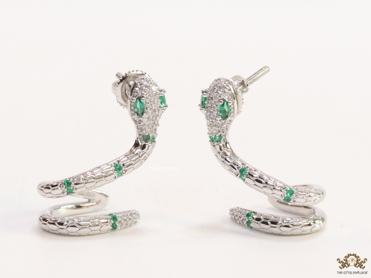 Platinum plated ear cuff pattern serpentine earrings with green cz