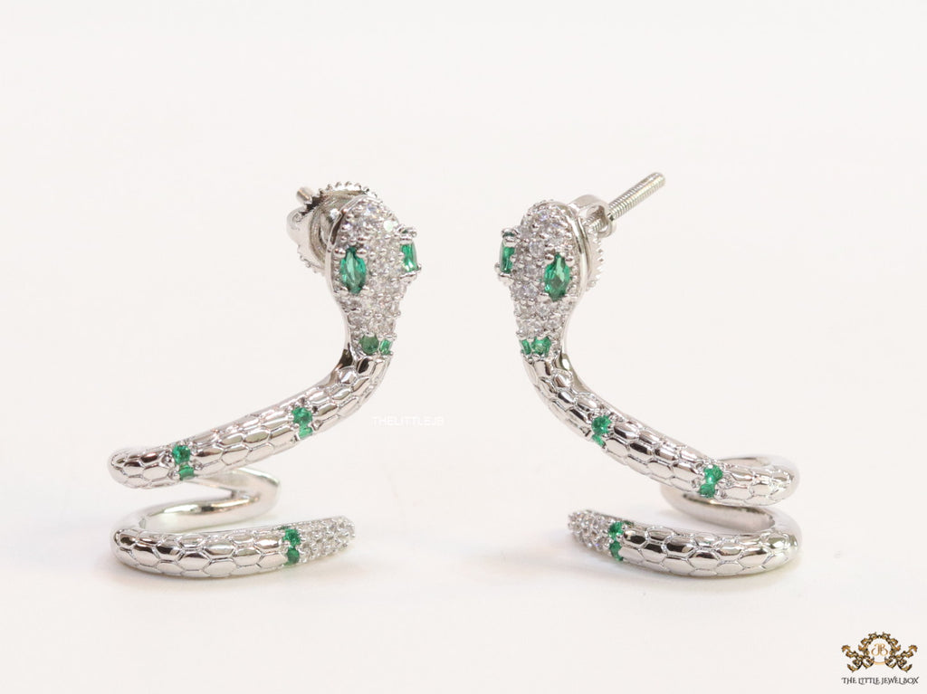 Platinum plated ear cuff pattern serpentine earrings with green cz