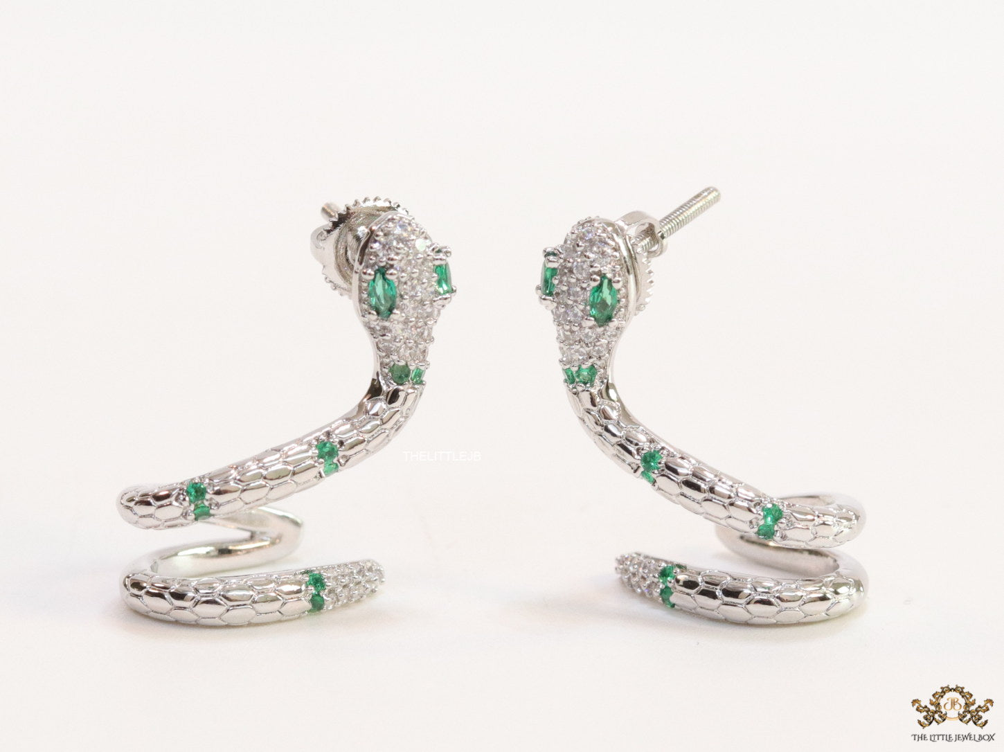 Platinum plated ear cuff pattern serpentine earrings with green cz