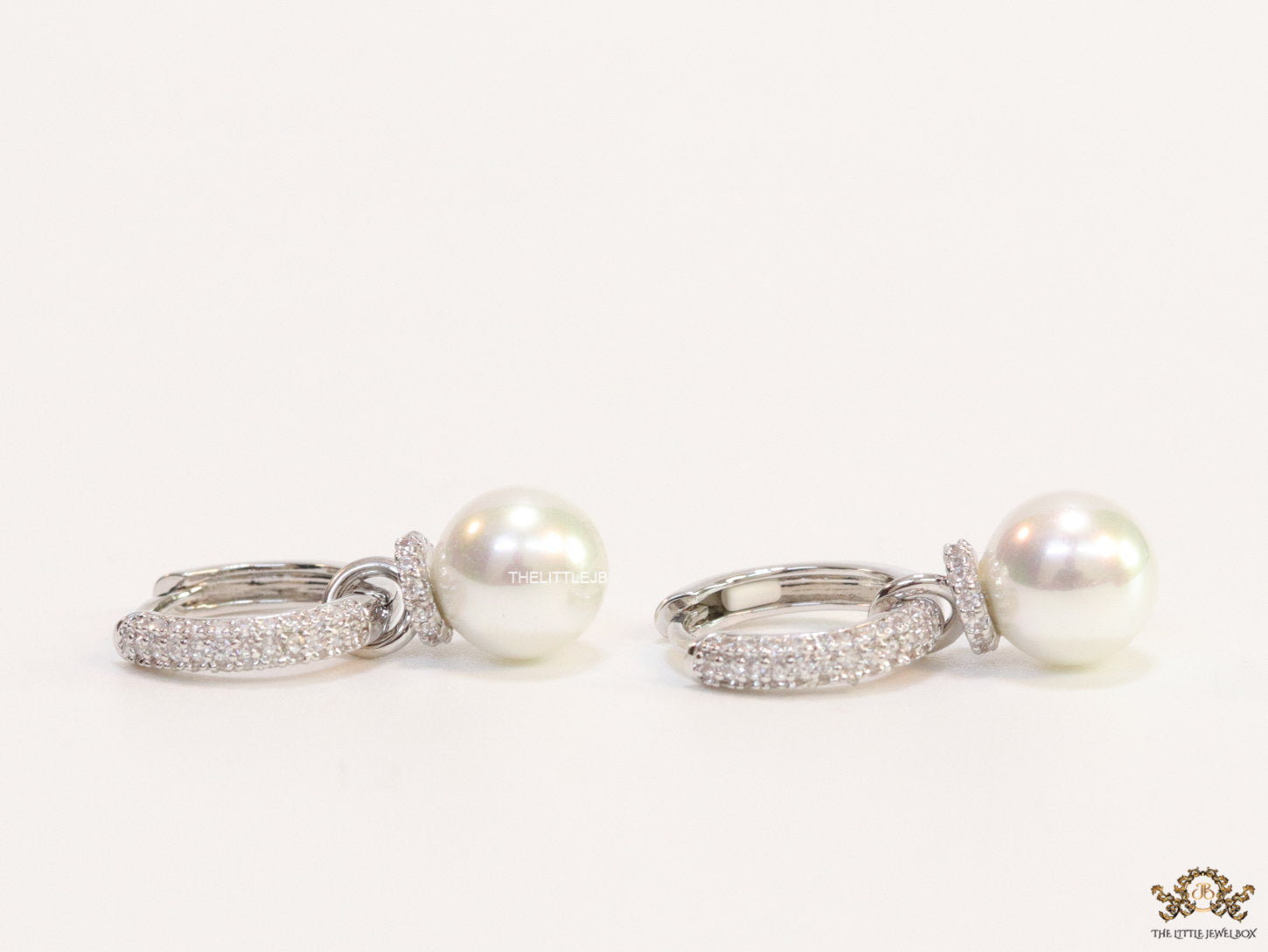 Platinum plated cz hoops with pearl drop