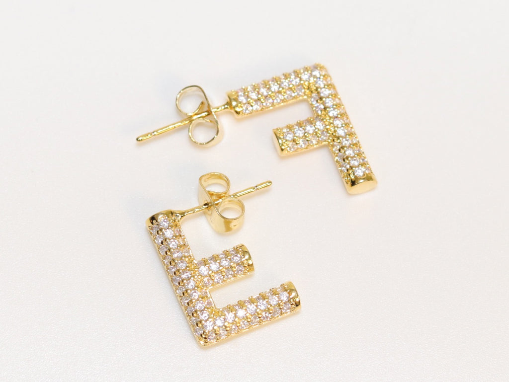 Alphabet F cz earrings in gold finish