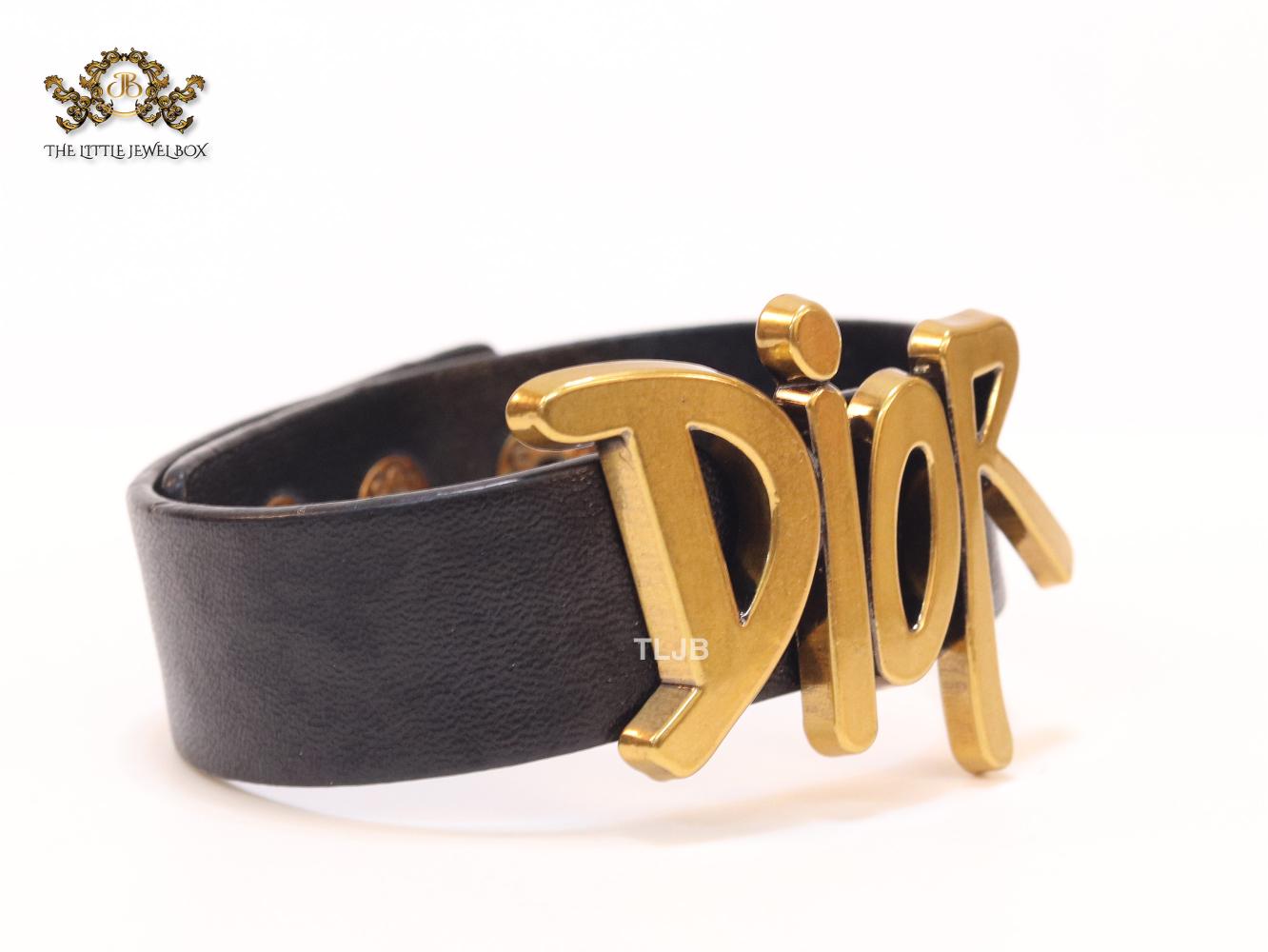 Alphabet D and black belted bracelet