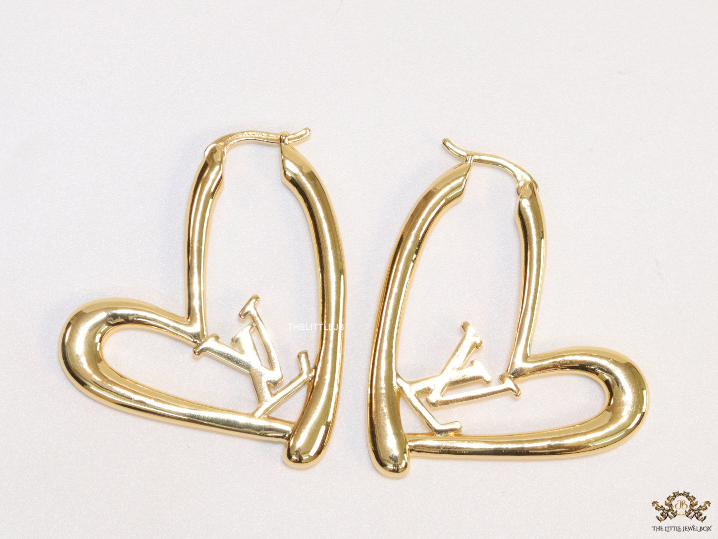 Golden heart shape hoops with alphabets