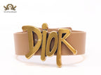Alphabet D and tan belted bracelet