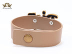 Alphabet D and tan belted bracelet