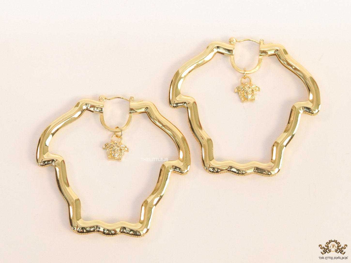 Golden Medusa frame hoops with Medusa drop