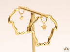 Golden Medusa frame hoops with Medusa drop