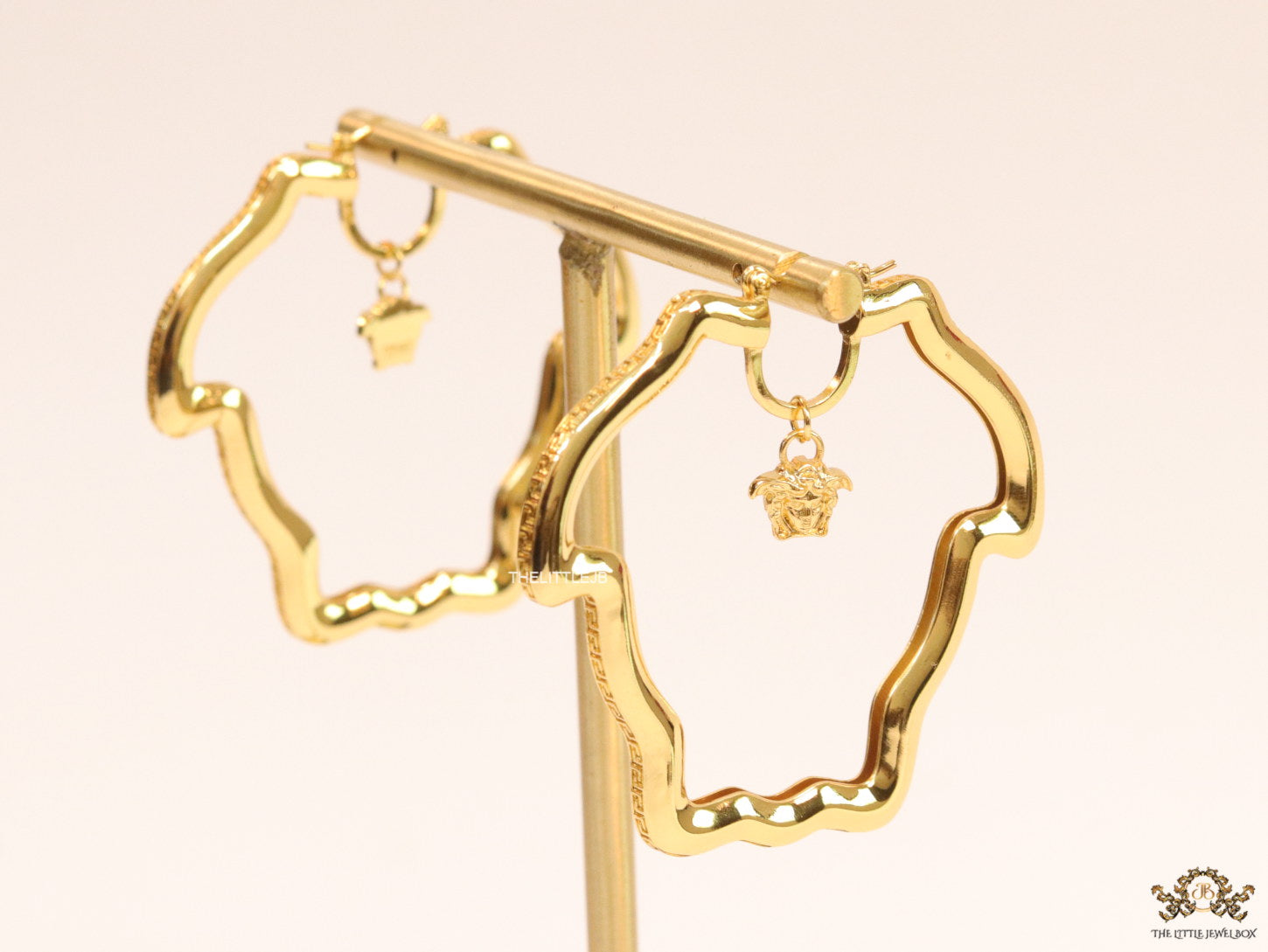 Golden Medusa frame hoops with Medusa drop