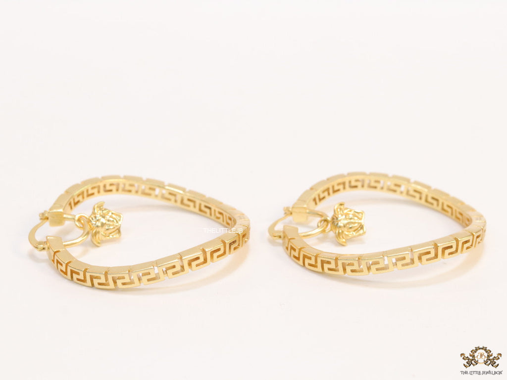 Designer golden twisted hoops 52 mm