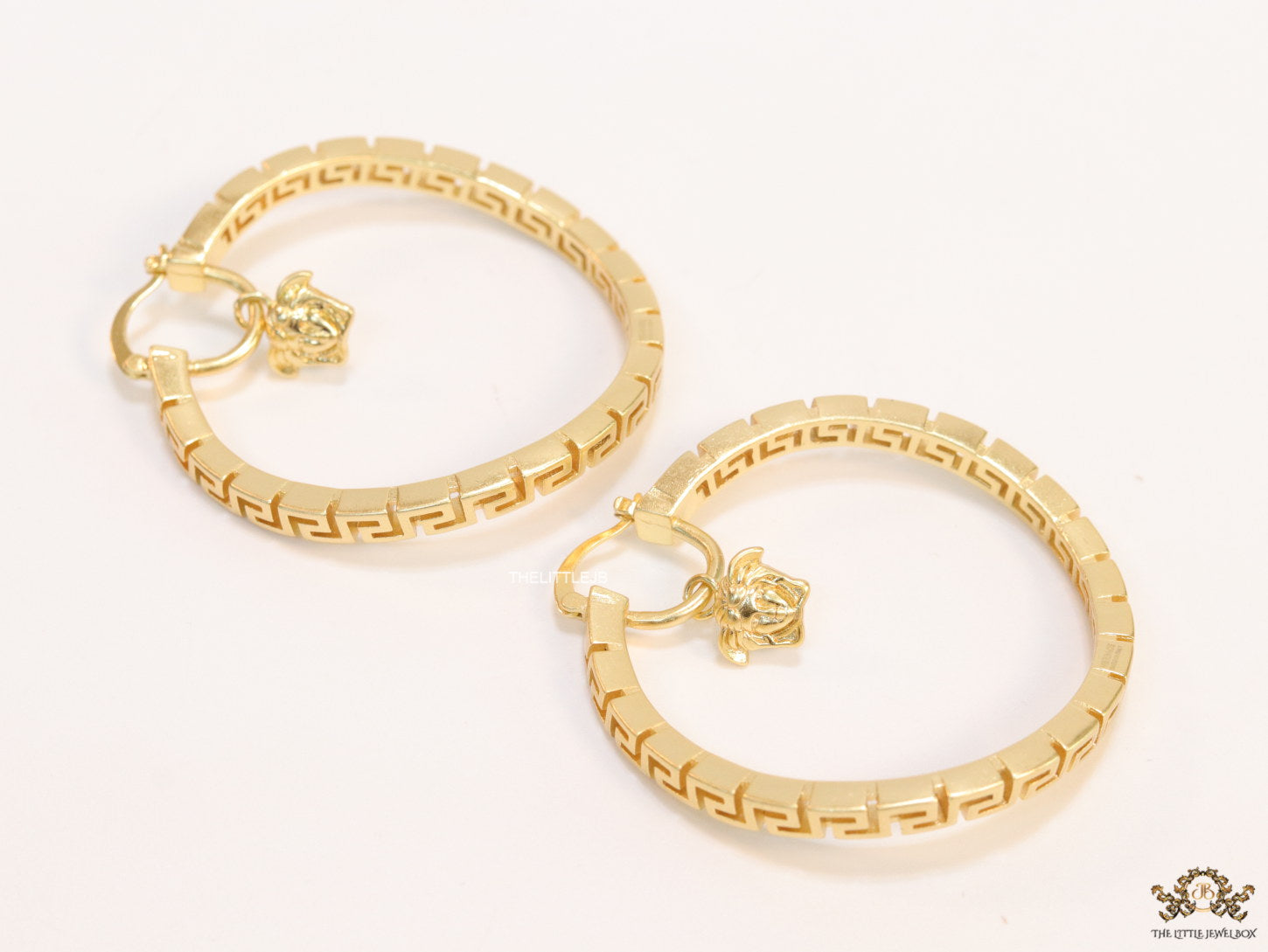 Designer golden twisted hoops 52 mm
