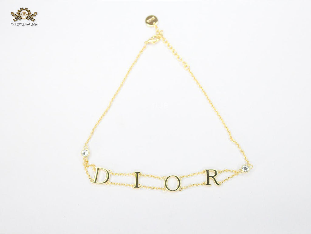 Alphabet D gold choker chain