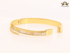 White & gold sleek screw bracelet