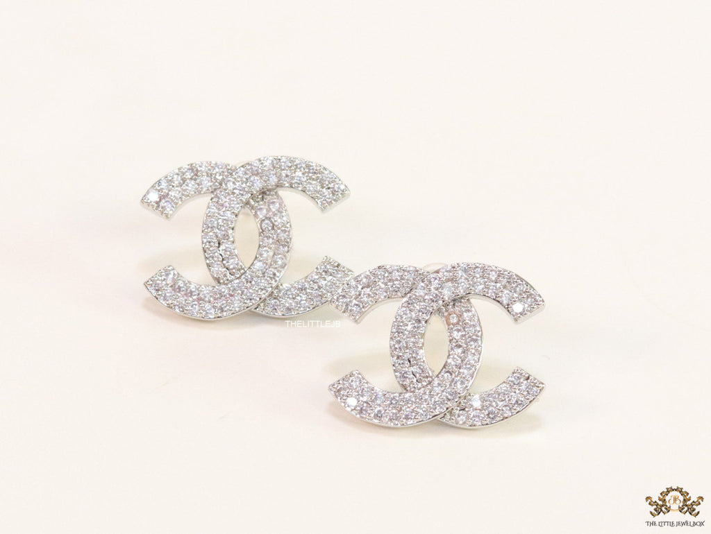 Platinum plated twin C motif cz studs