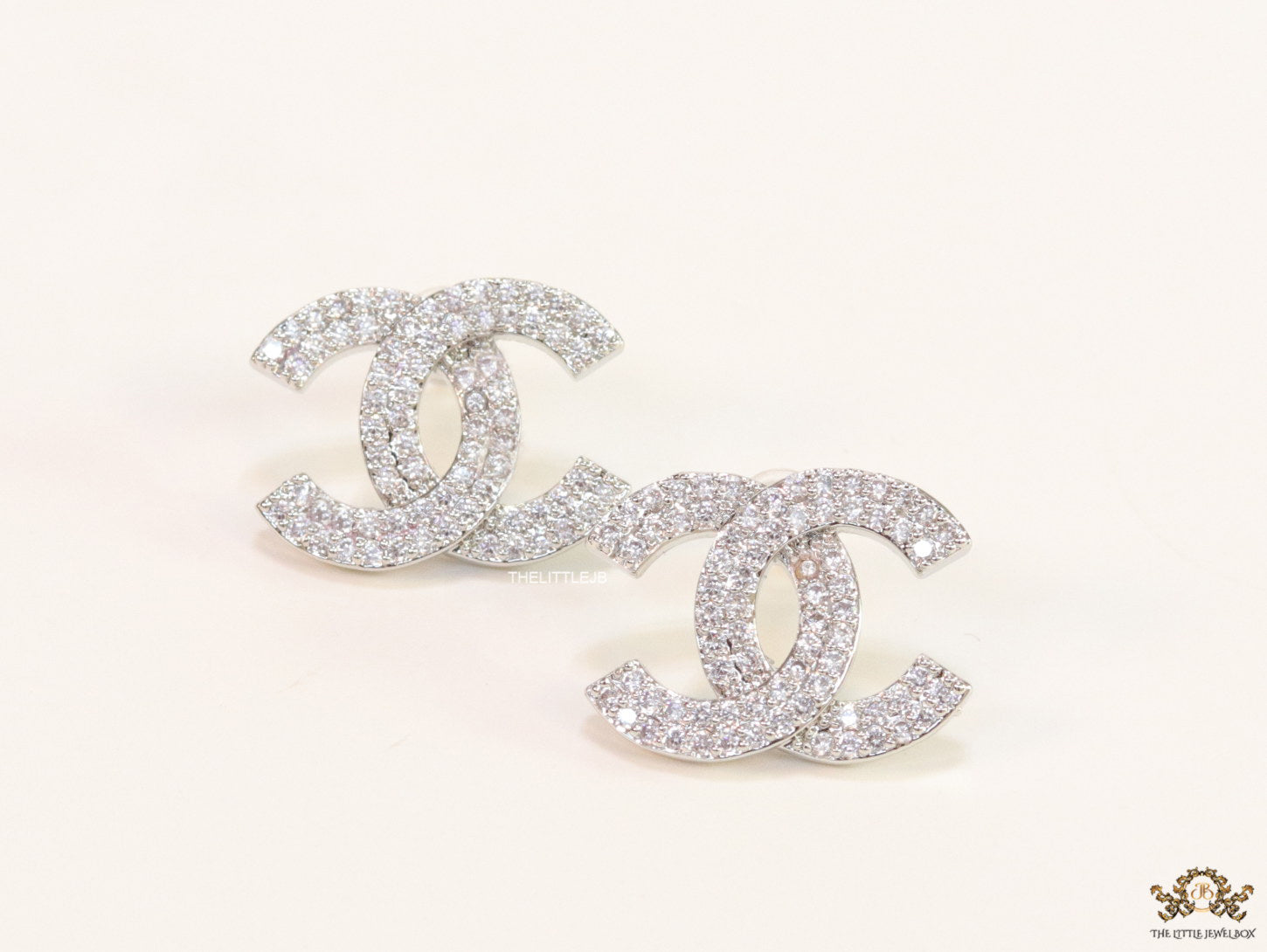 Platinum plated twin C motif cz studs