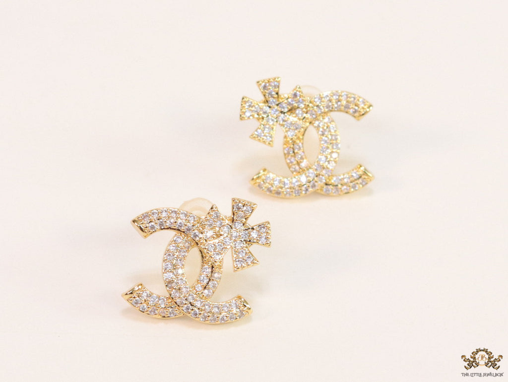 Gold plated flower and twin C motif cz studs