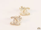 Gold plated flower and twin C motif cz studs