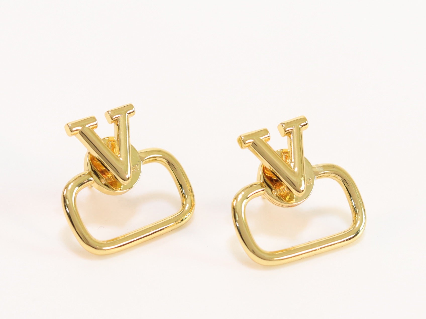 Alphabet V golden studs