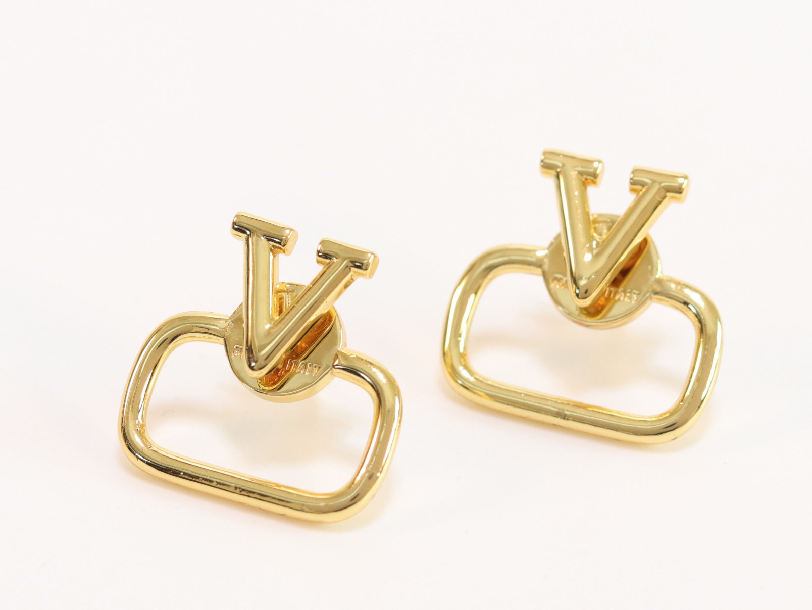 Alphabet V golden studs