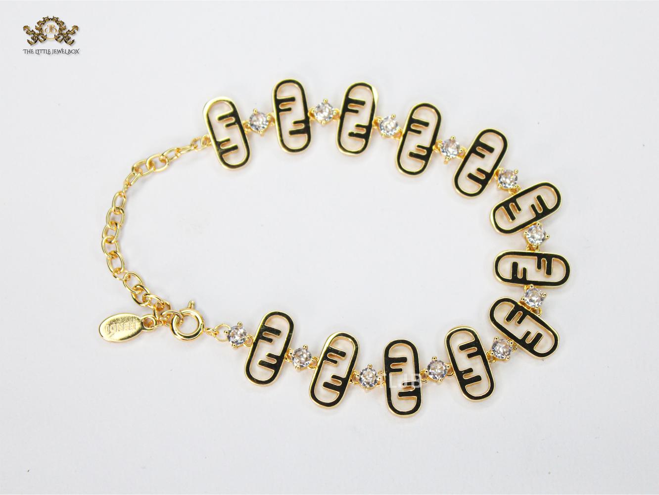 Alphabet F studded gold bracelet