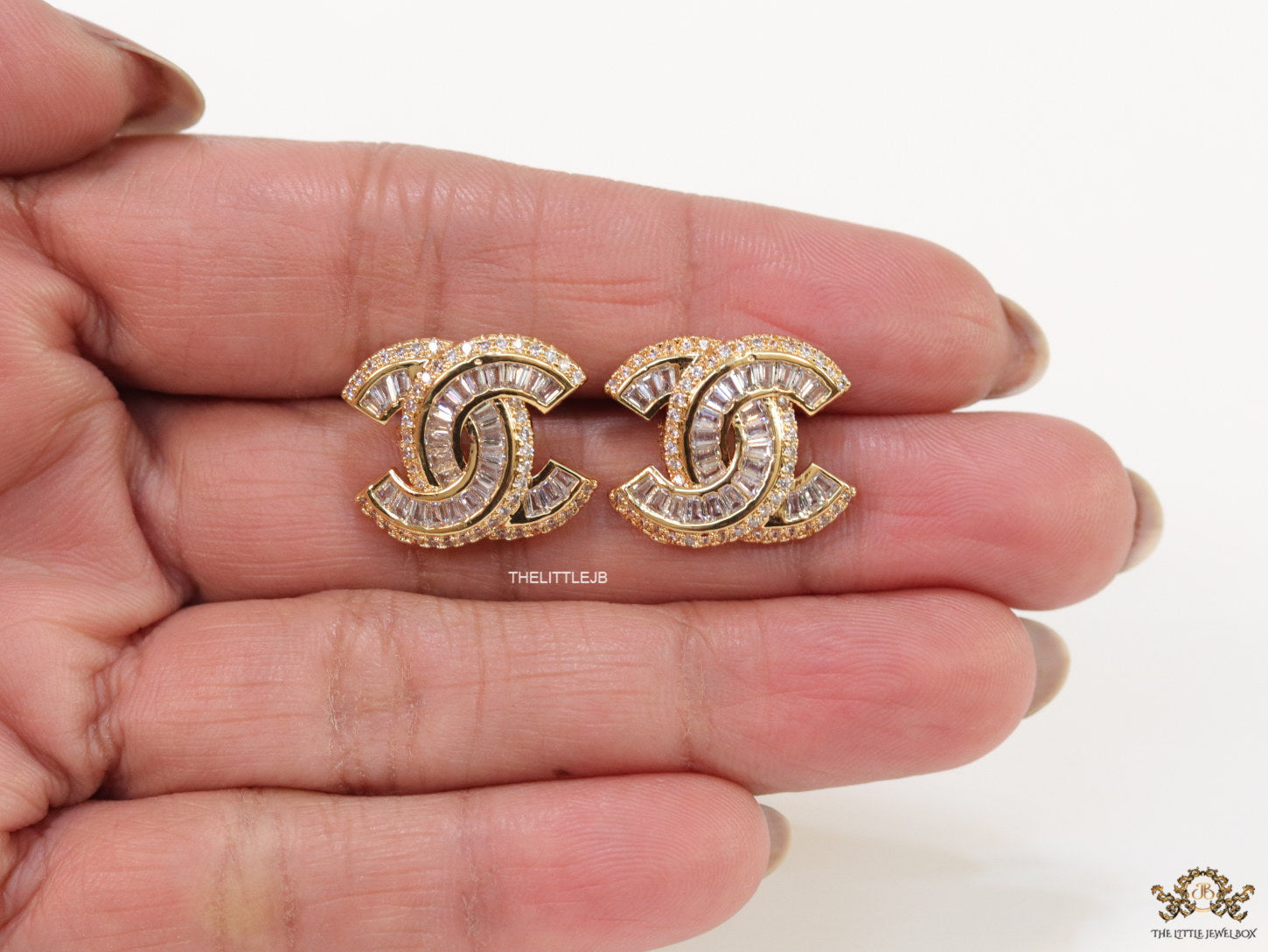 Gold plated twin C motif cz baguette studs